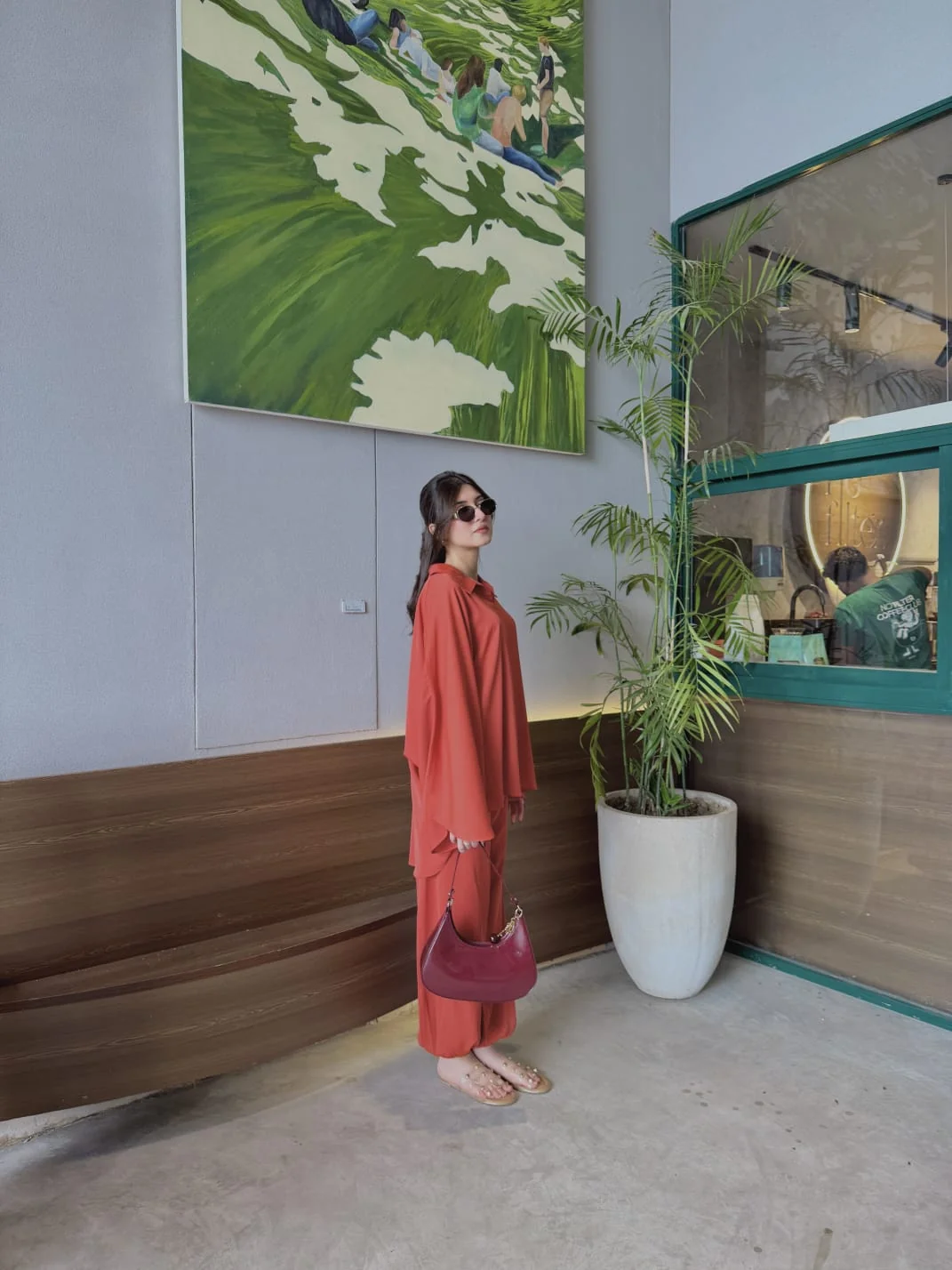 SIENNA FLOW SET — burnt coral co-ord set by BK ATELIERS, side view showing the drape of the trousers