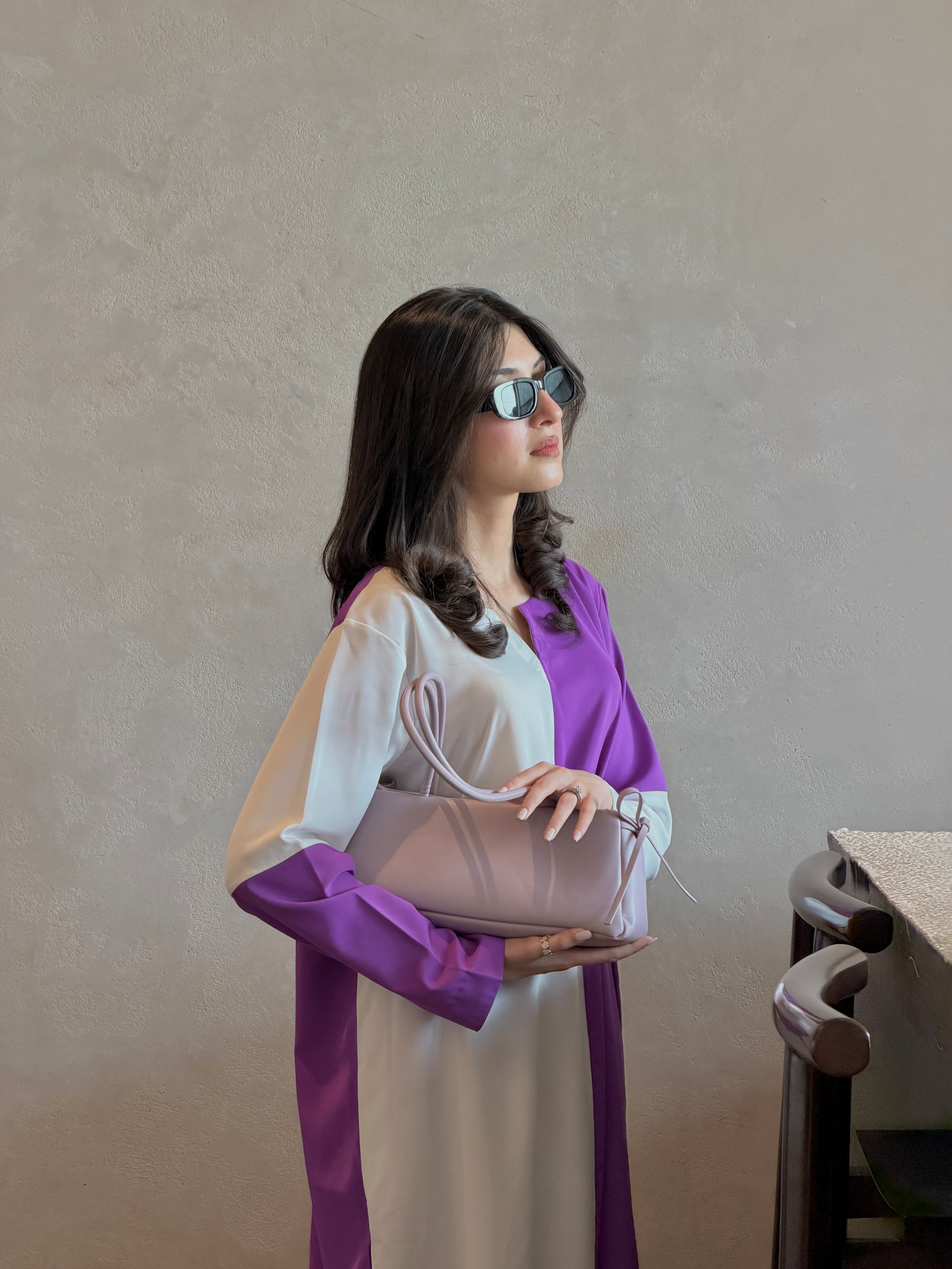 AURELIA SET — ivory and purple co-ord set by BK ATELIERS, side view showing the drape of the trousers